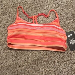 Pink orange and peach sports bra